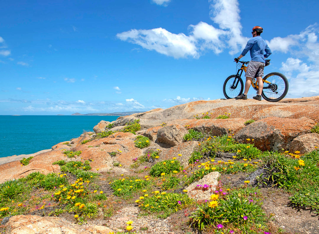 E-bike rider enjoying coastal views on the Encounter Bikeway near Victor Harbor